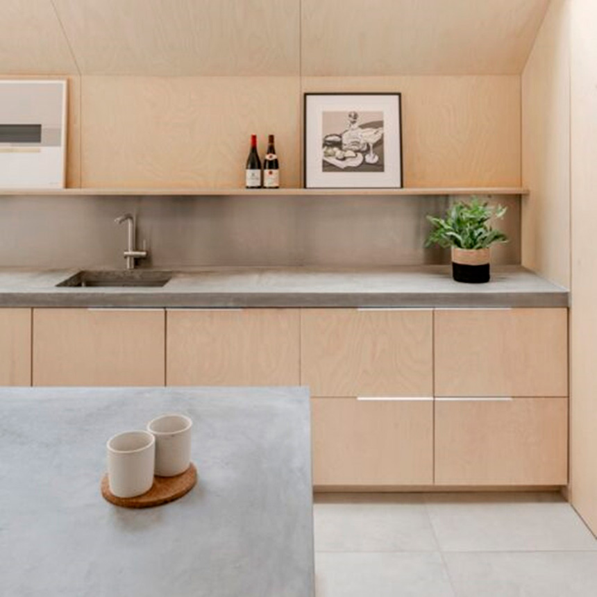Encimera, isla y mesa de comedor hechas a medida y fabricadas en hormigón.