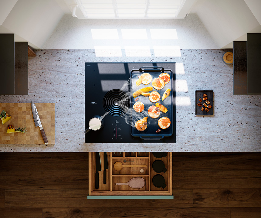 Placa de cocción Bora Pure con extractor integrado y acabado negro mate en cocina moderna