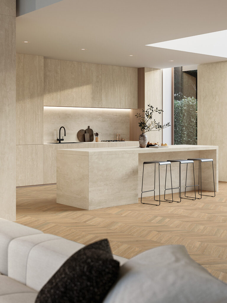 Isla de cocina en gres porcelánico blanco efecto mármol