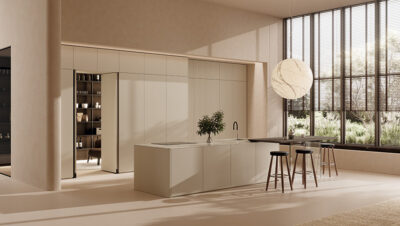 Cocina ONE de Ernestomeda en Blanco Vainilla mate y Roble Gris Ceniza con isla central y diseño contemporáneo.