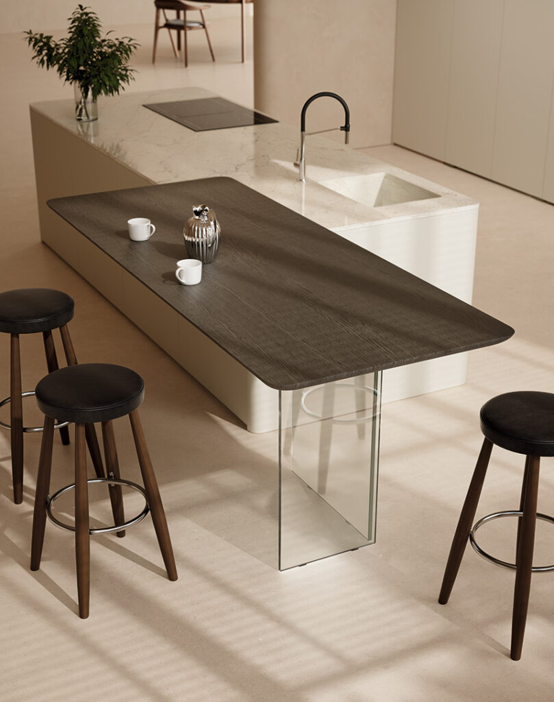 Isla monolítica de cocina ONE con encimera WPS Capriccio brillante y mesa snack Twist