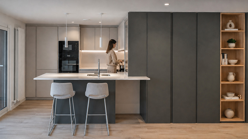 cocina con península integrada en salón