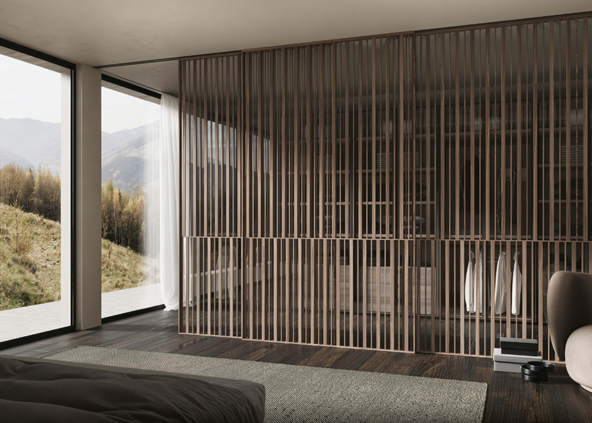 Puerta corredera de aluminio acabado Nogal Antik de Besform para proyectos de interiorismo y diseño residencial
